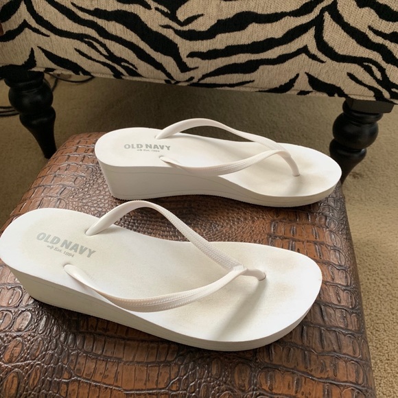 white heeled flip flops